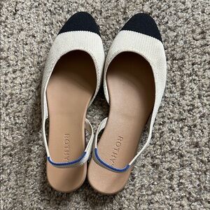Rothy's Black and Cream Flats with Blue Accent